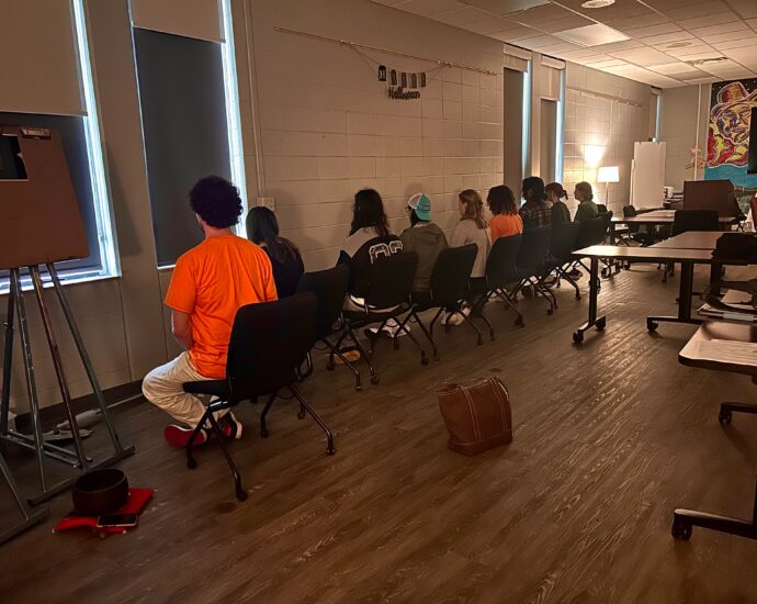 Students practice zazen meditation with Art Instructor David Titterington in the classroom.