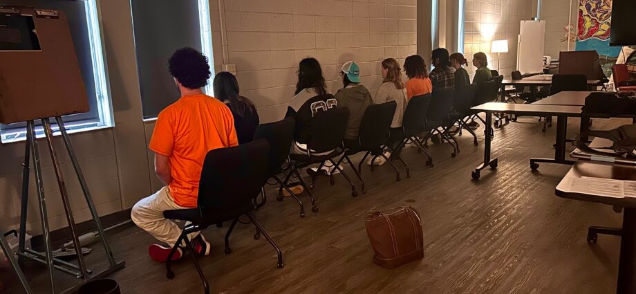 Students practice zazen meditation with Art Instructor David Titterington in the classroom.
